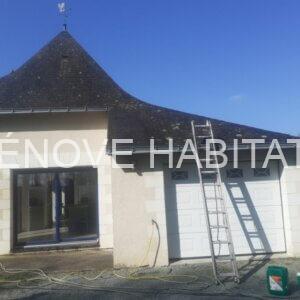 Traitement anti-mousse sur une toiture